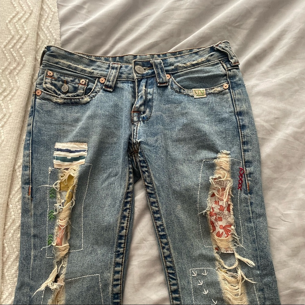 y2k low rise vintage true religion jeans, has rips with different fabrics